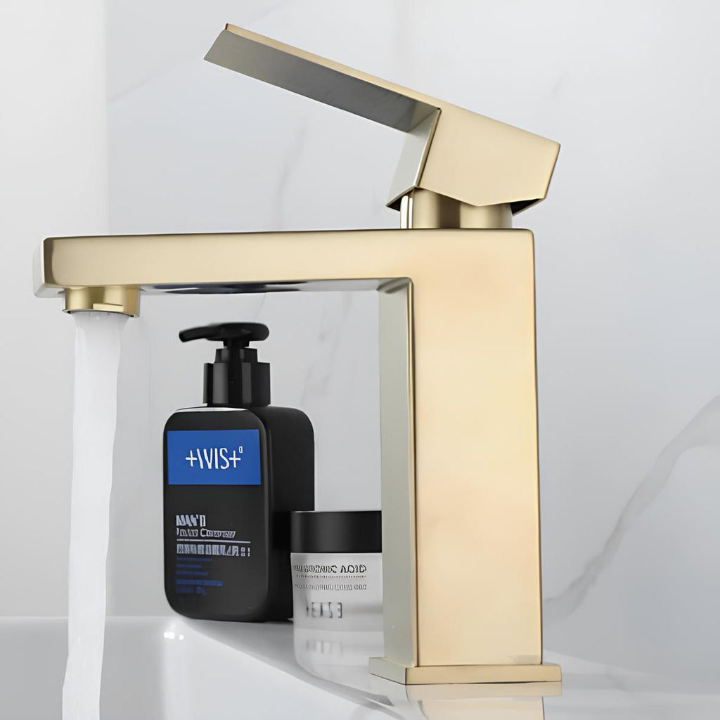 Robinet lavabo mitigeur en inox finition or brossé  Le Mitigeur