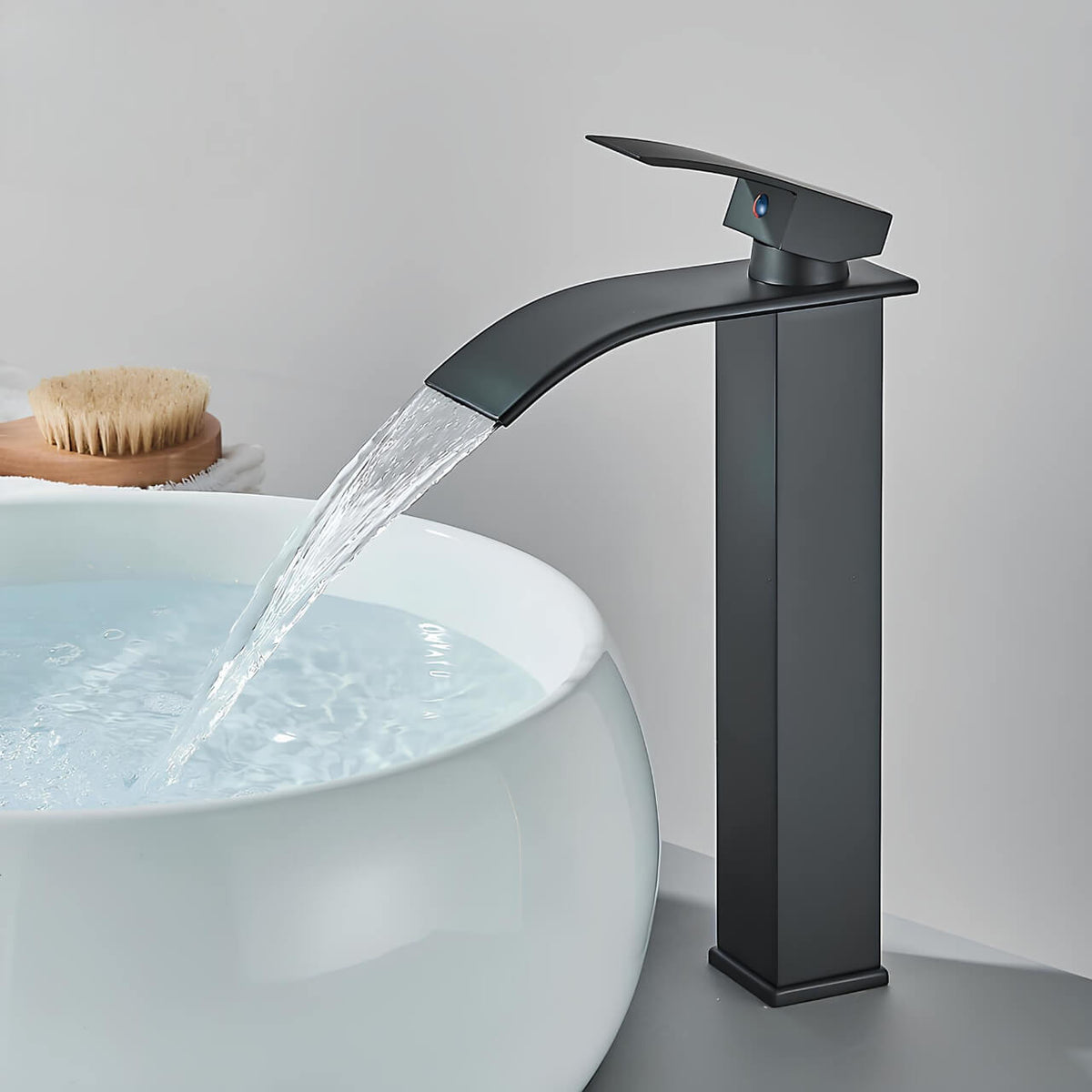 Robinet vasque - Bec cascade  Le Mitigeur